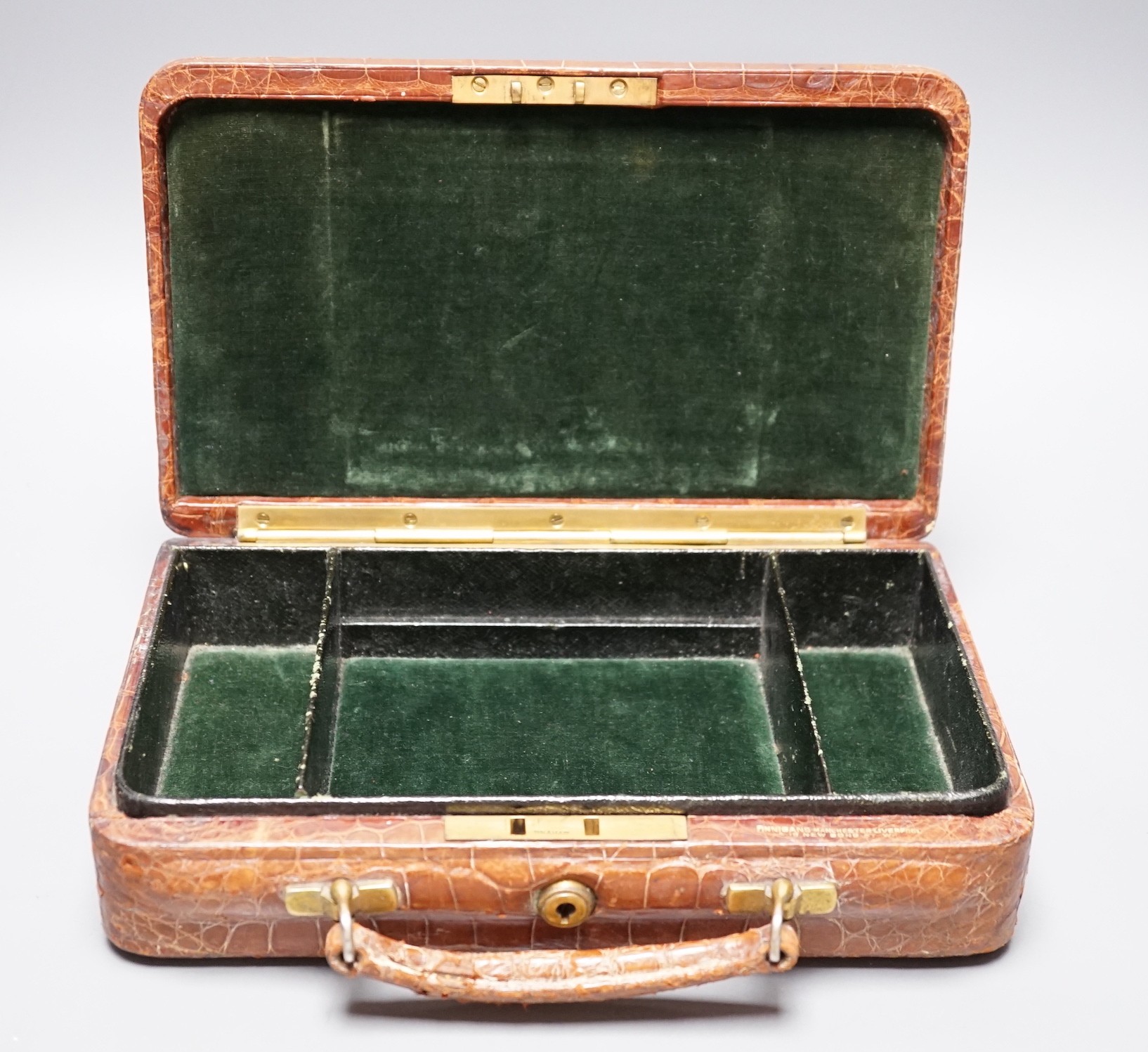 A pre-war Finnegans of Manchester crocodile skin jewellery case